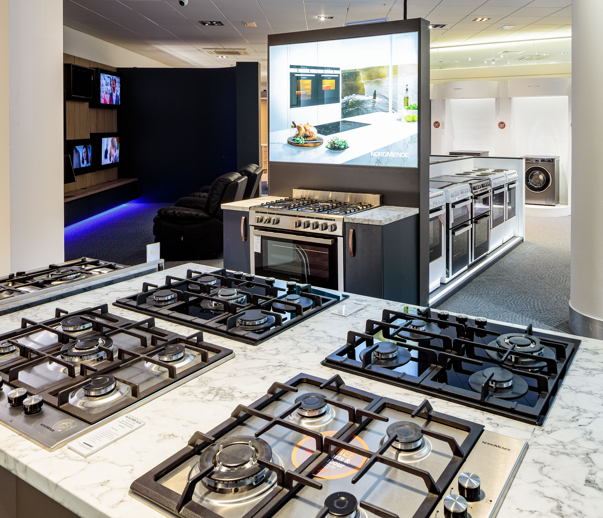 Live demo area with hobs and smart ovens
